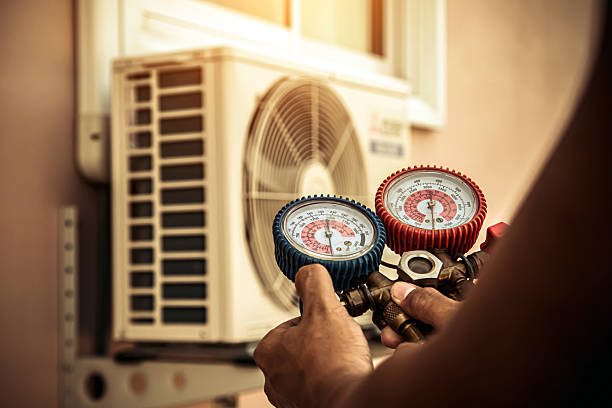 Professional Ductwork Repair technician working in Babson Park, MA